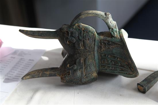 A Chinese archaistic bronze jue vessel and cover, 29cm, damage